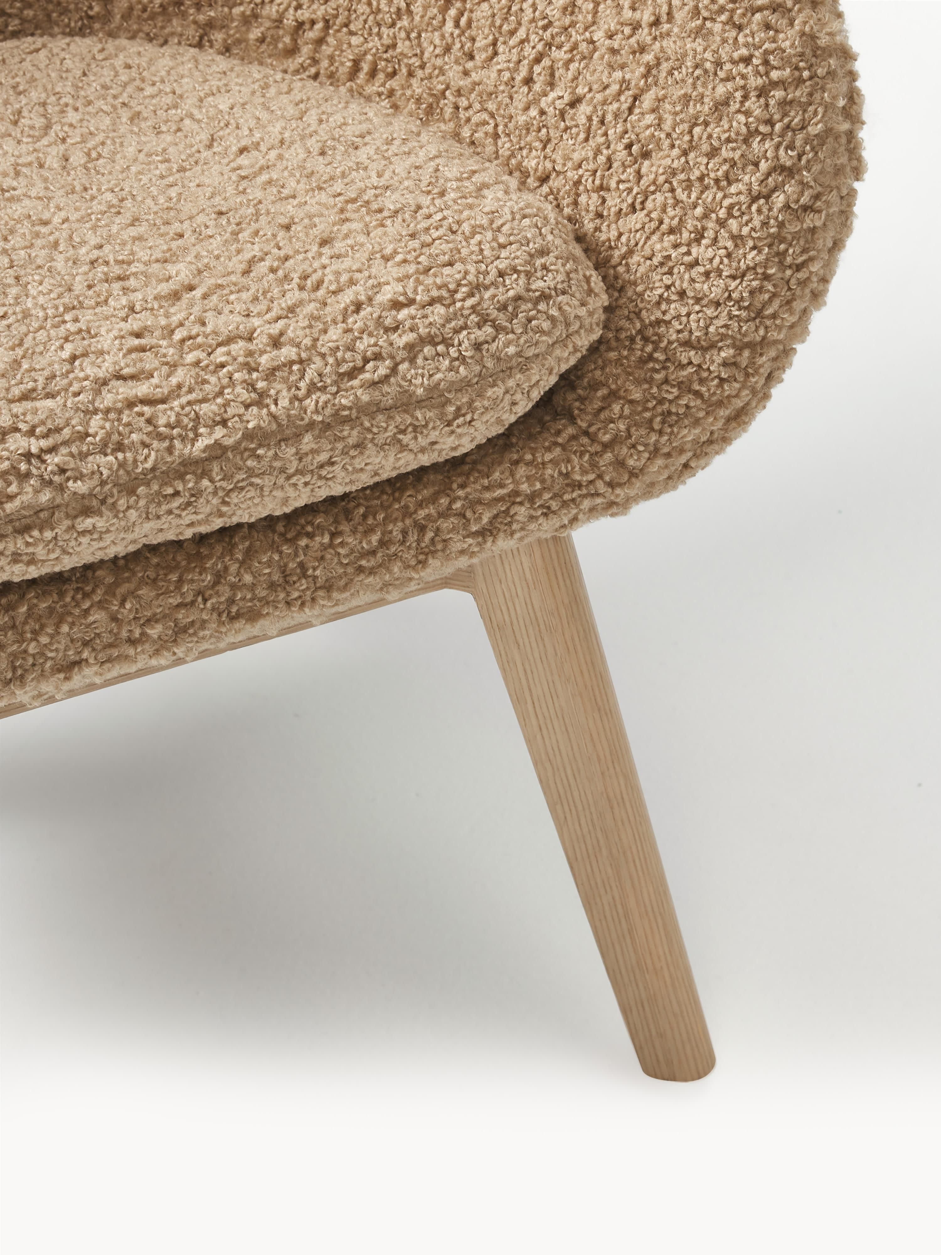 Teddy fauteuil Wing met houten poten