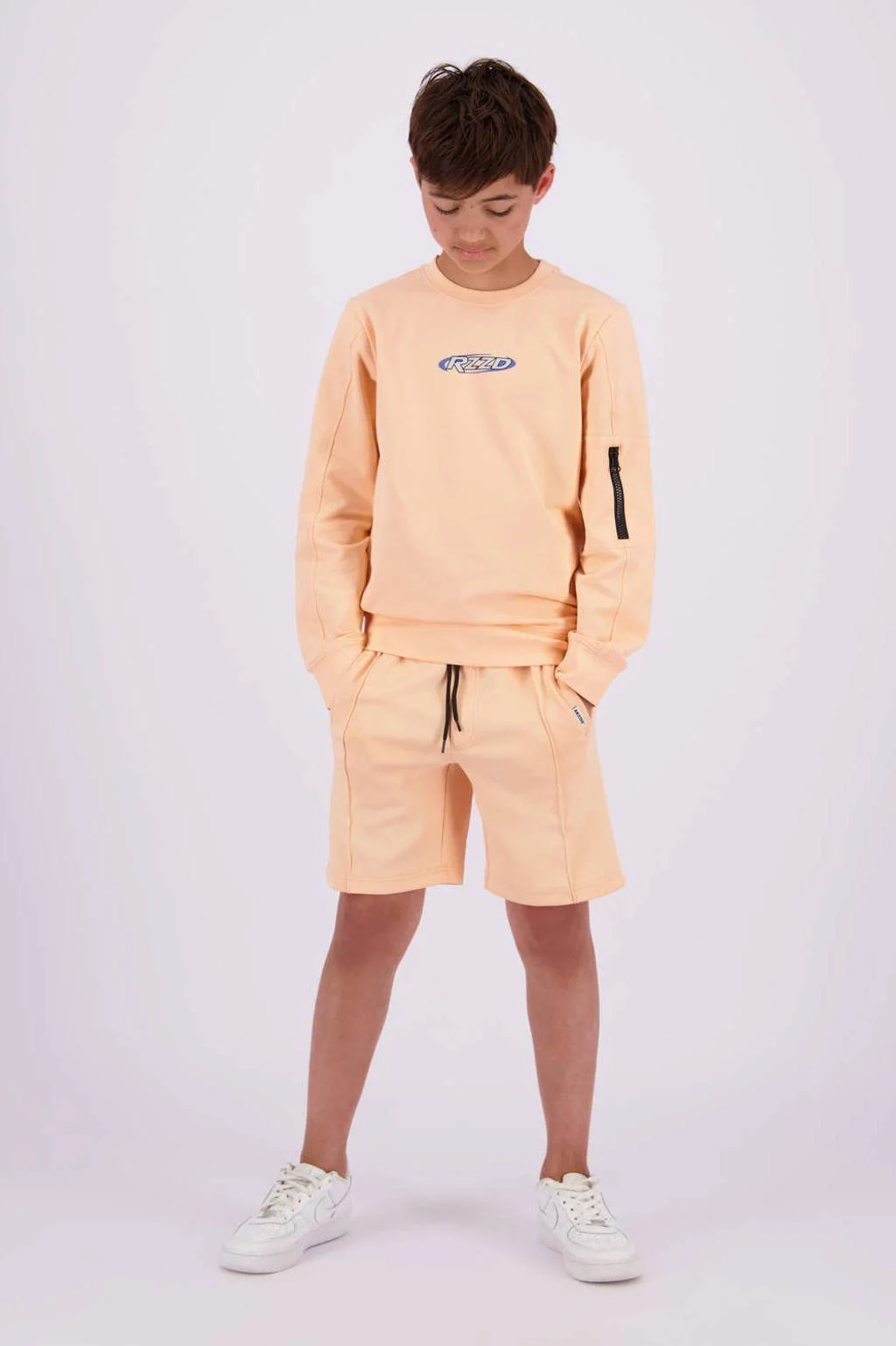 Raizzed sweater Nagi met logo zachtoranje
