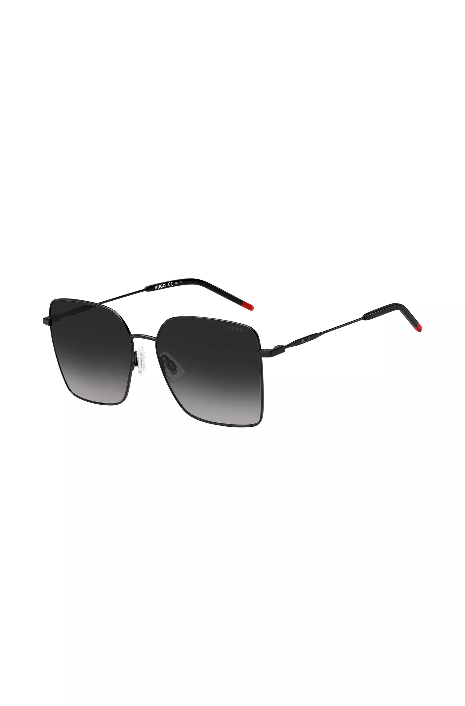 Óculos de sol HUGO em metal vermelho e preto com ponteiras vermelhas.