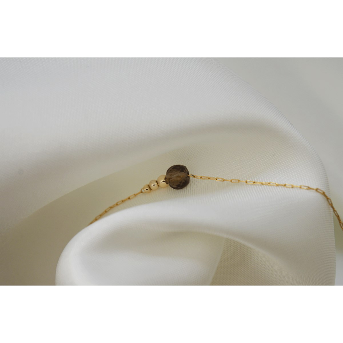 Bracelet  fin orné d une perle semi-precieuse  de Quartz Fumé
