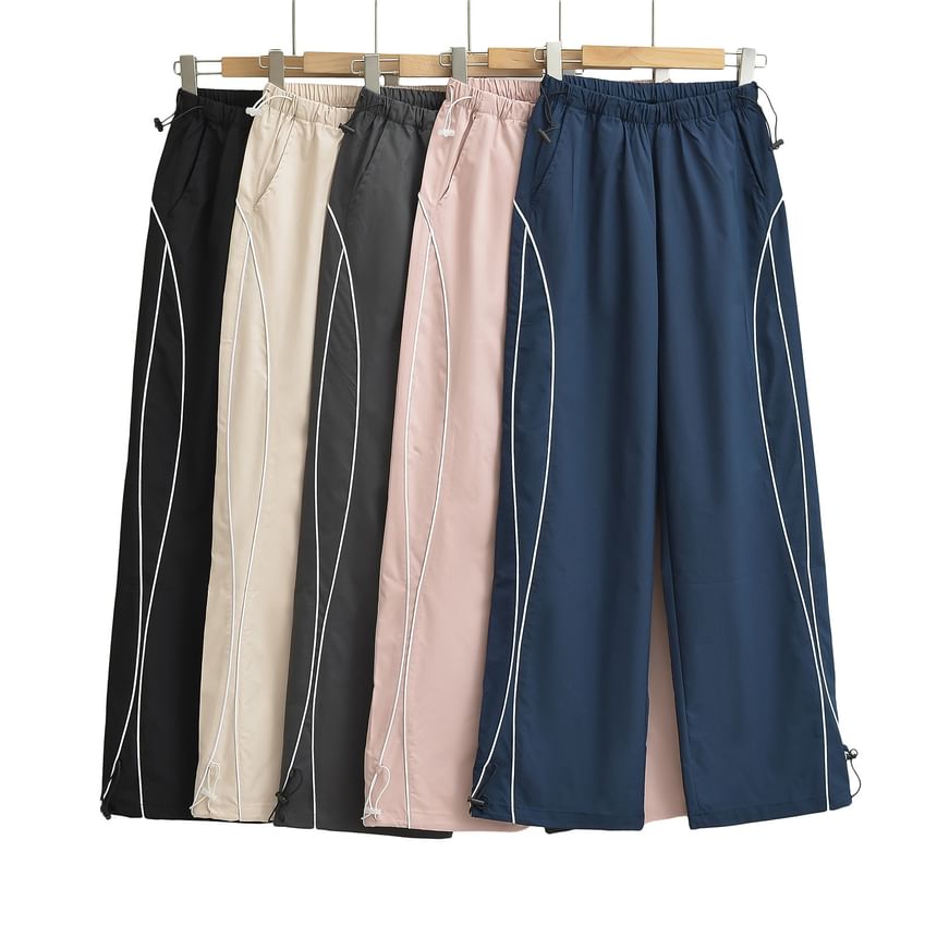 Asiris - Wijde joggingbroek met hoge taille en trekkoord