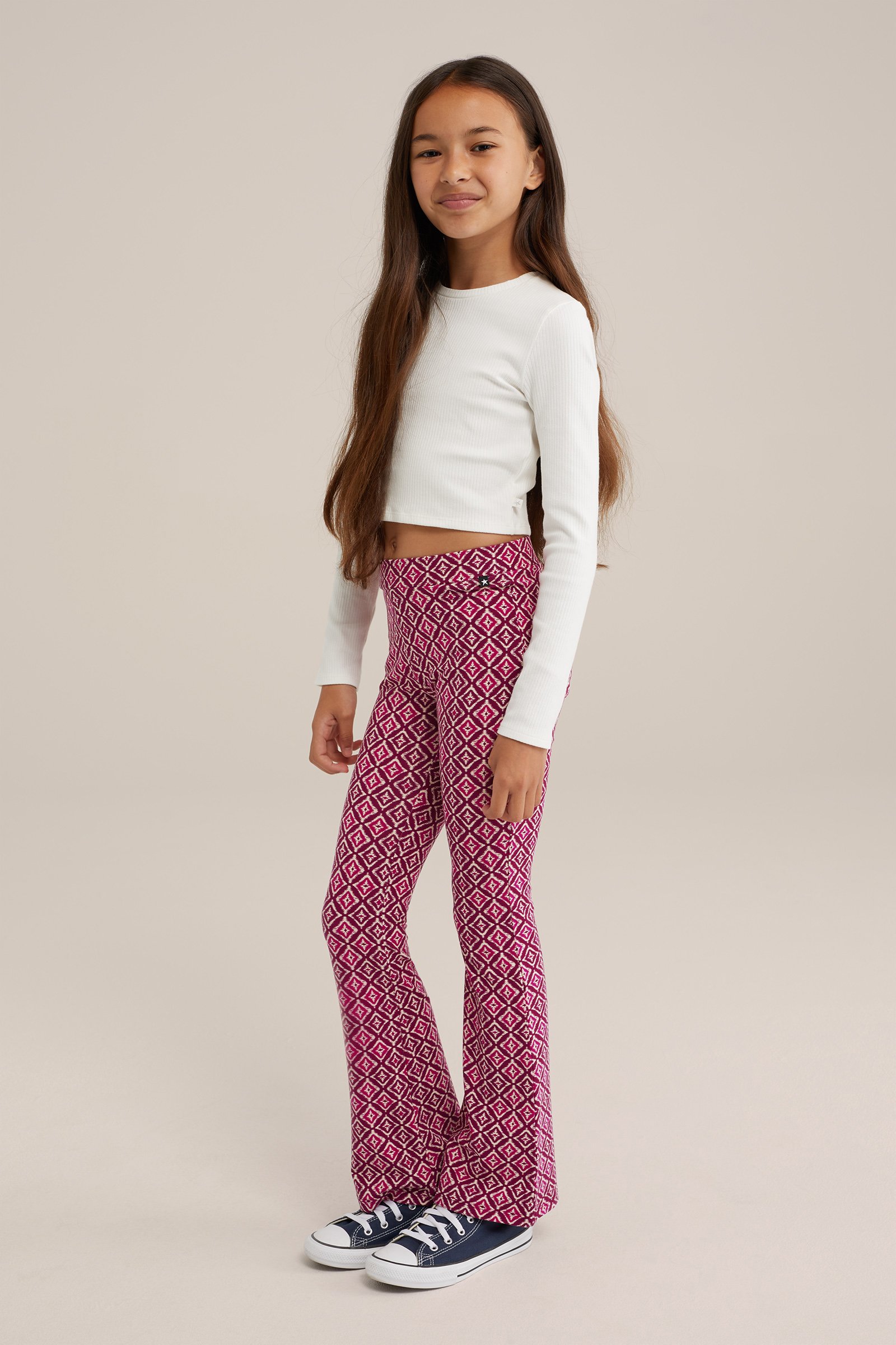 Meisjes flared legging met dessin WE Fashion Roze