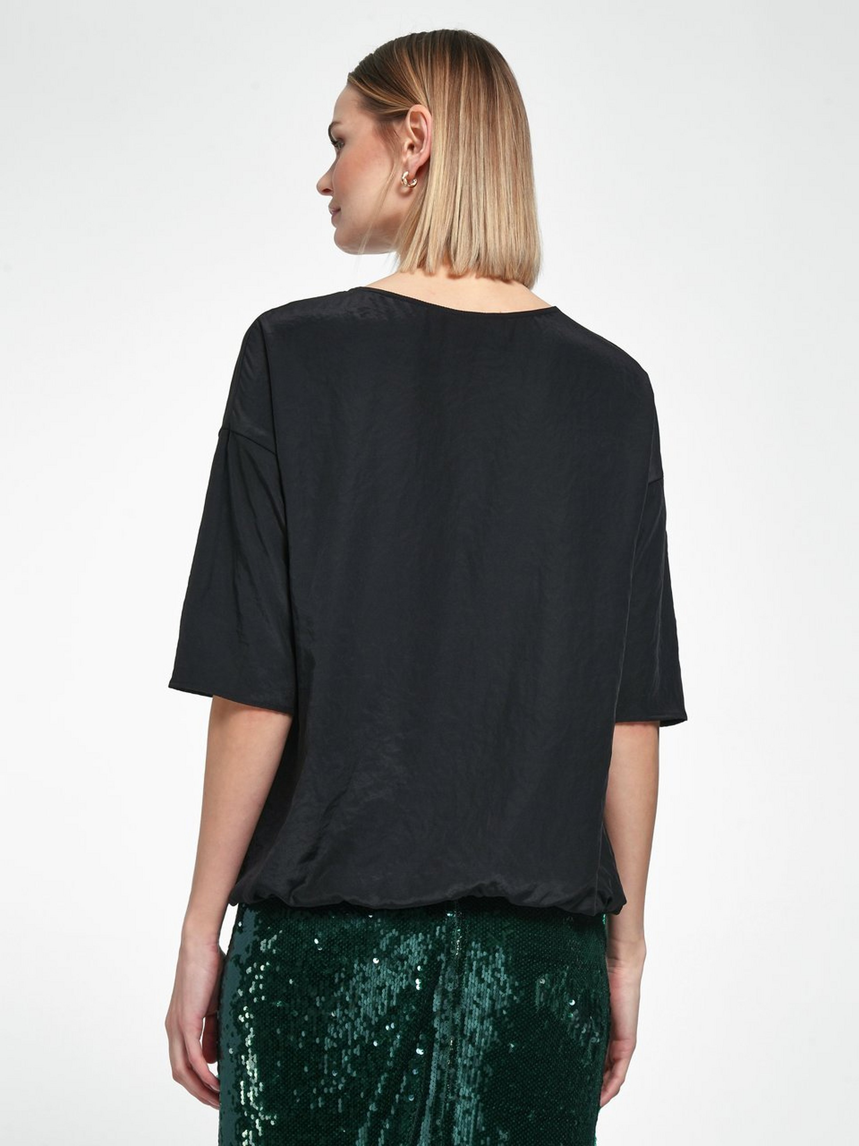 Bluse mit überschnittener Schulter