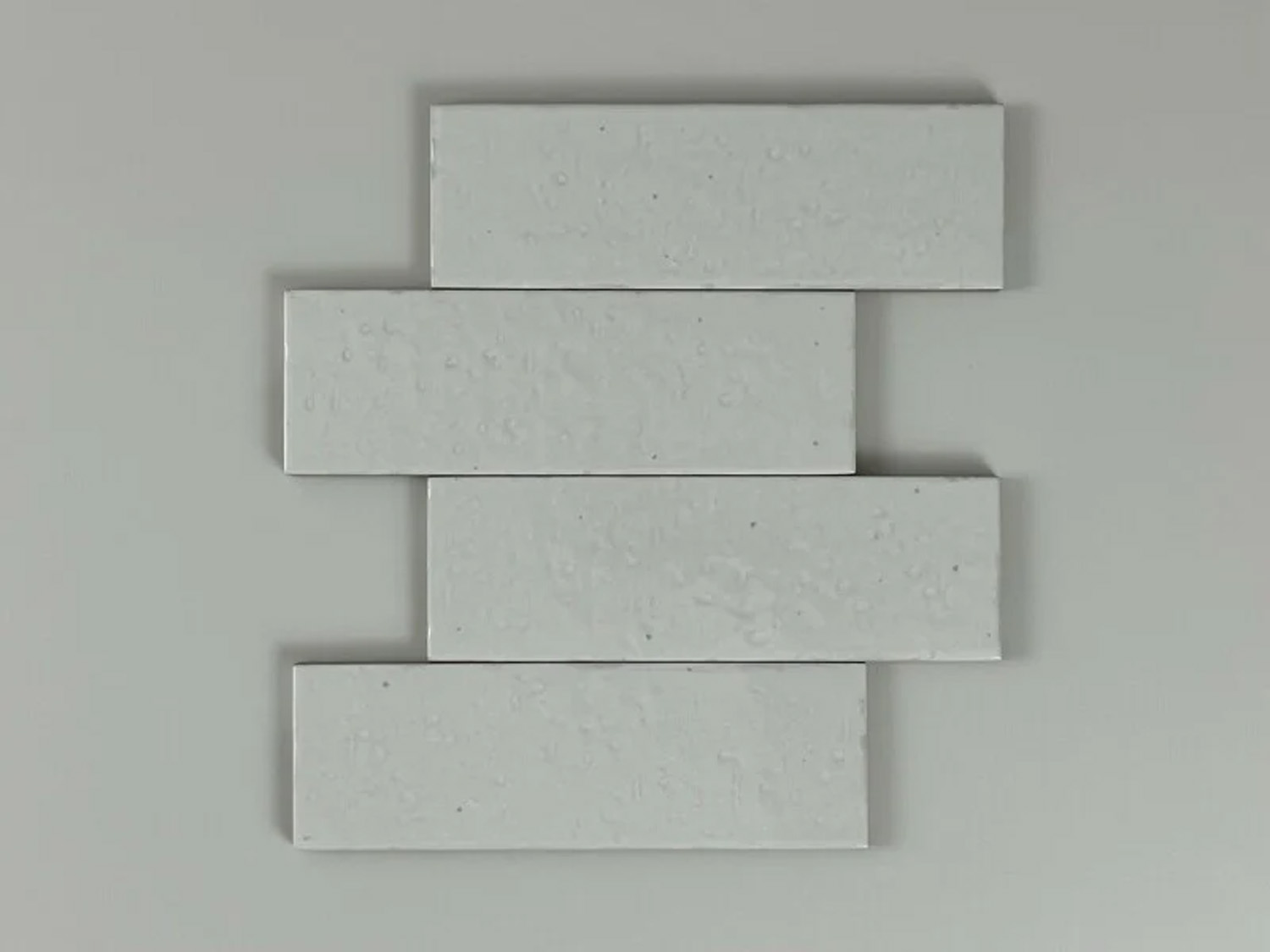 Tegelsample: Jabo Kalma wandtegel 19x6cm wit glans
