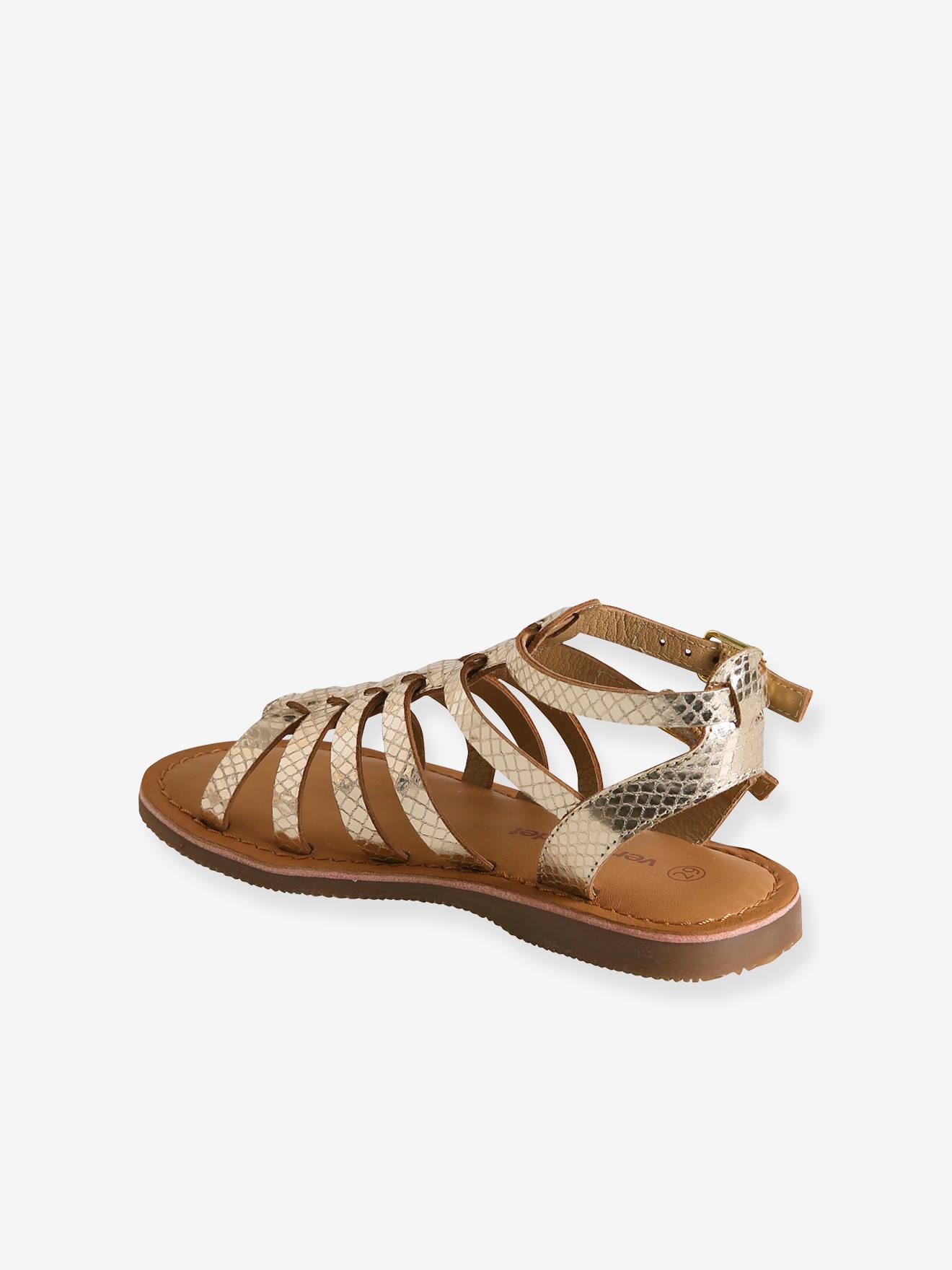 Sandálias altas de couro dourado com um toque minimalista para meninas.