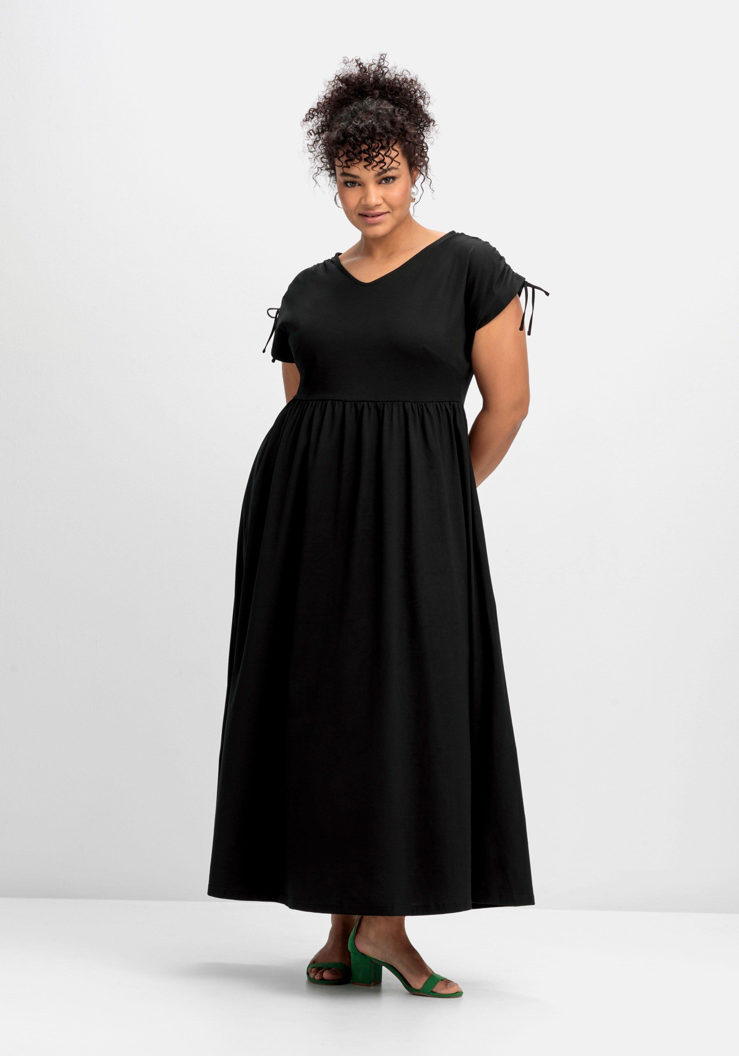 Jerseykleid mit weitem Rock und V-Ausschnitt
