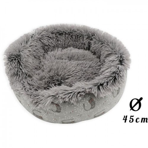 Cama redonda AIME em couro bege para animais de estimação de pequeno porte.