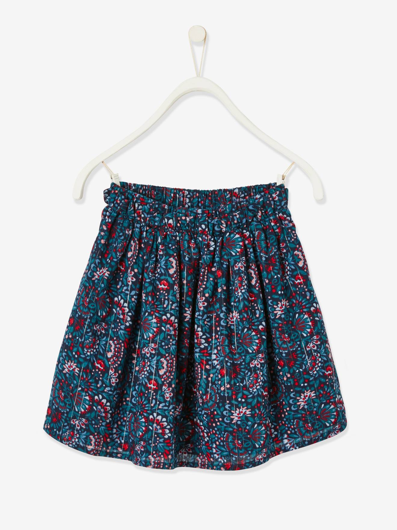 Saia estampada floral com detalhes em fios brilhantes, estampa azul vibrante para menina.