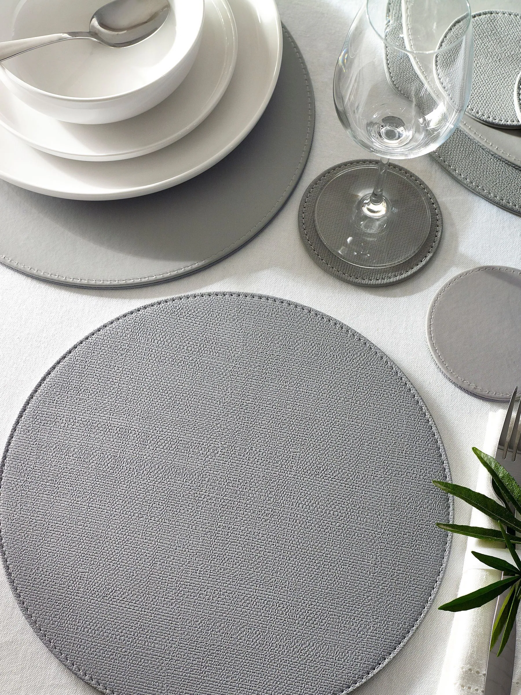 Set van 4 omkeerbare placemats en onderzetters van imitatieleer