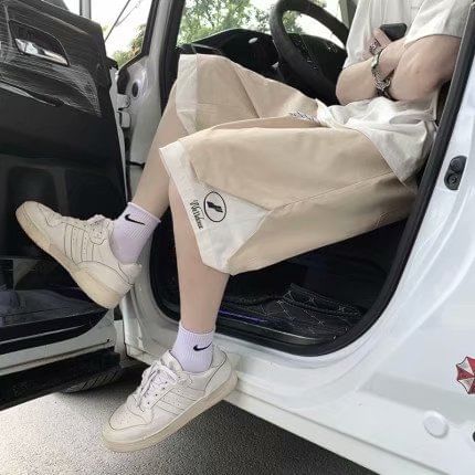 Macho - Tweekleurige shorts met wijde pijpen en trekkoord in de taille
