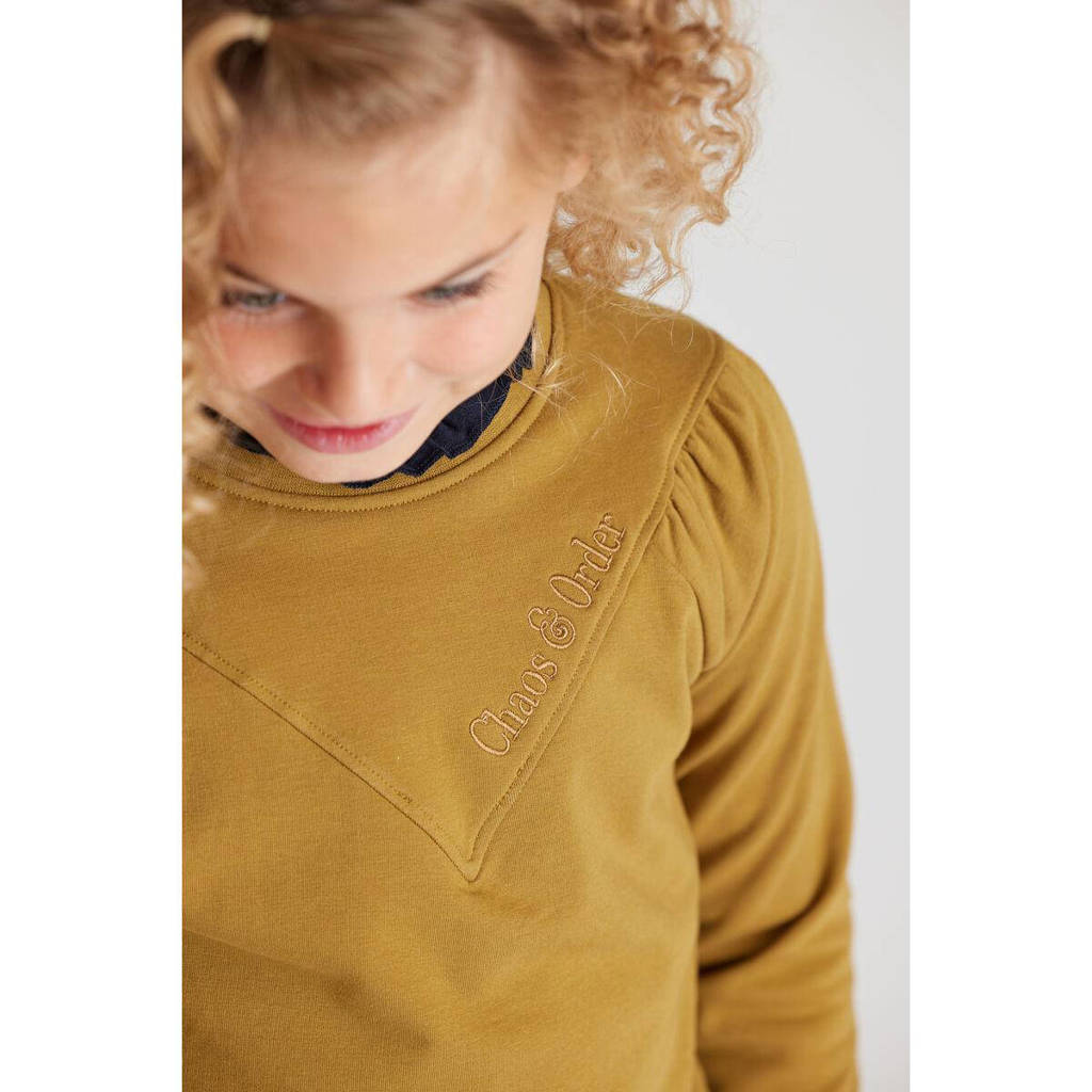 Chaos-and-Order sweater geel