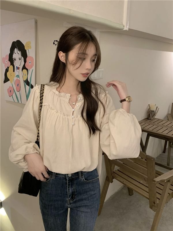 Sienne - Effen blouse met V-hals en ruches