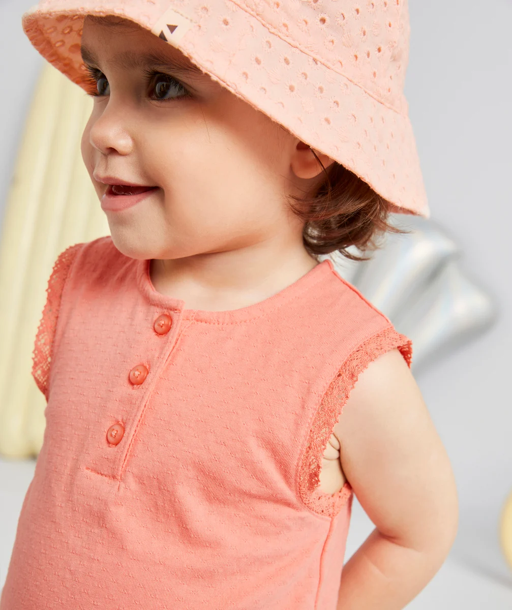 T-SHIRT BÉBÉ FILLE EN COTON SANS MANCHES COULEUR CORAIL