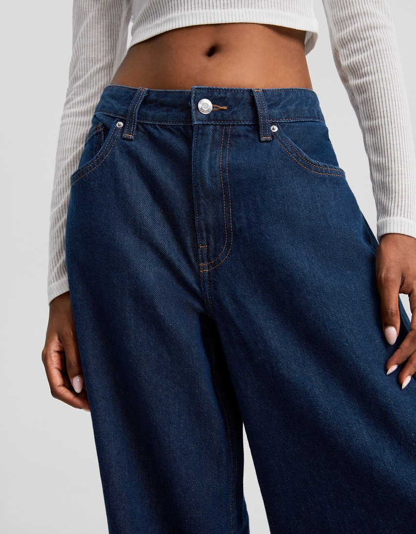 calça jeans de perna larga