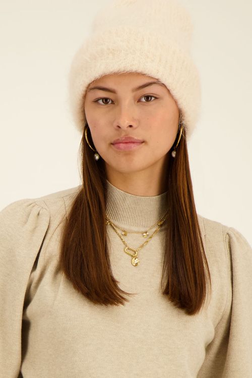 Beige hairy muts