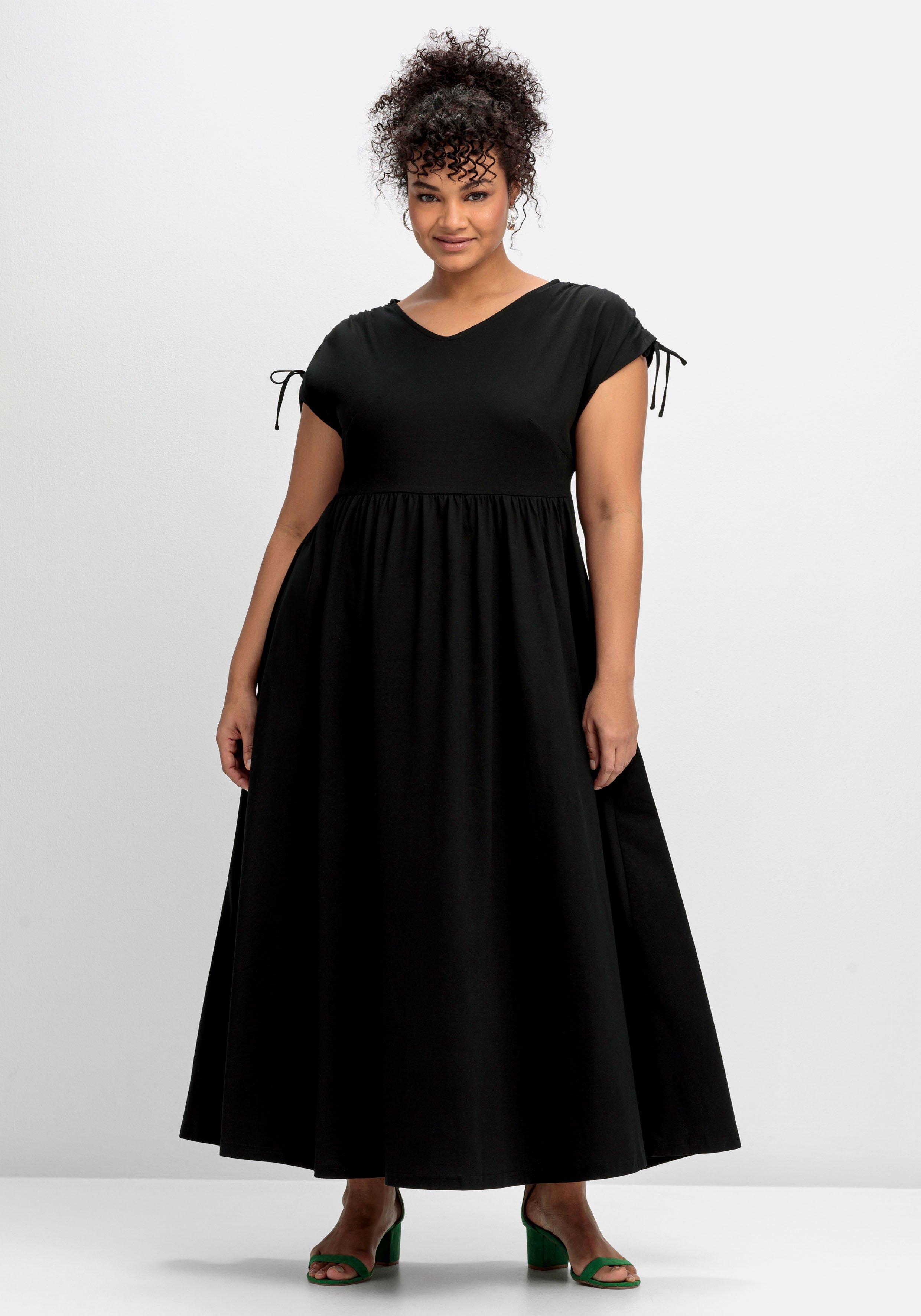Jerseykleid mit weitem Rock und V-Ausschnitt