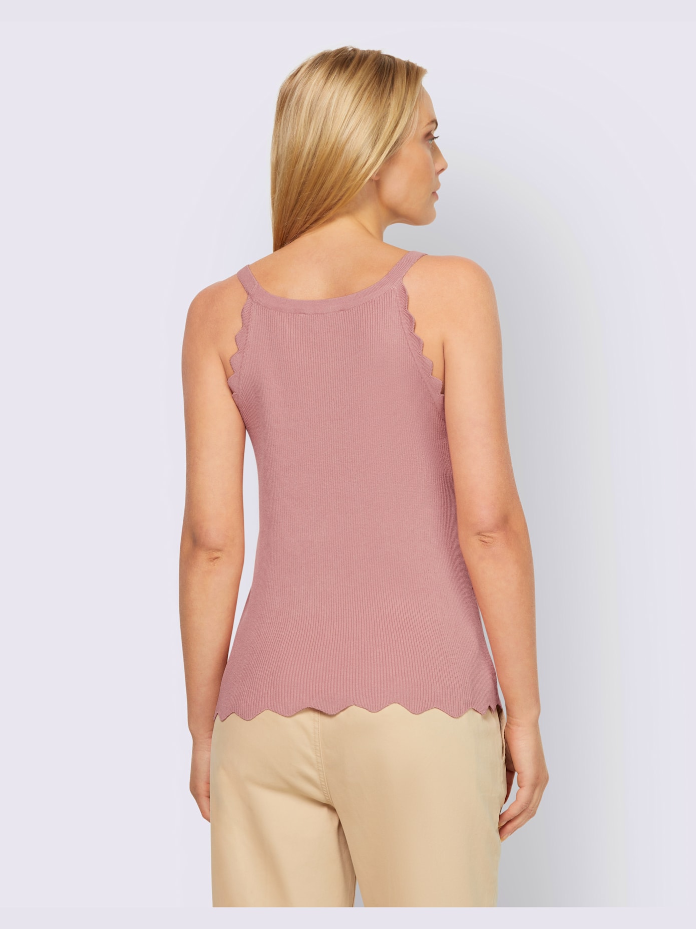 Débardeur en tricot joli ourlet ondulé