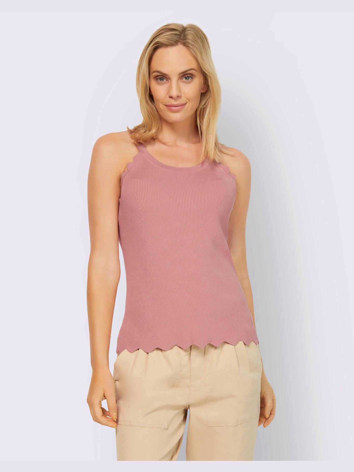 Débardeur en tricot joli ourlet ondulé