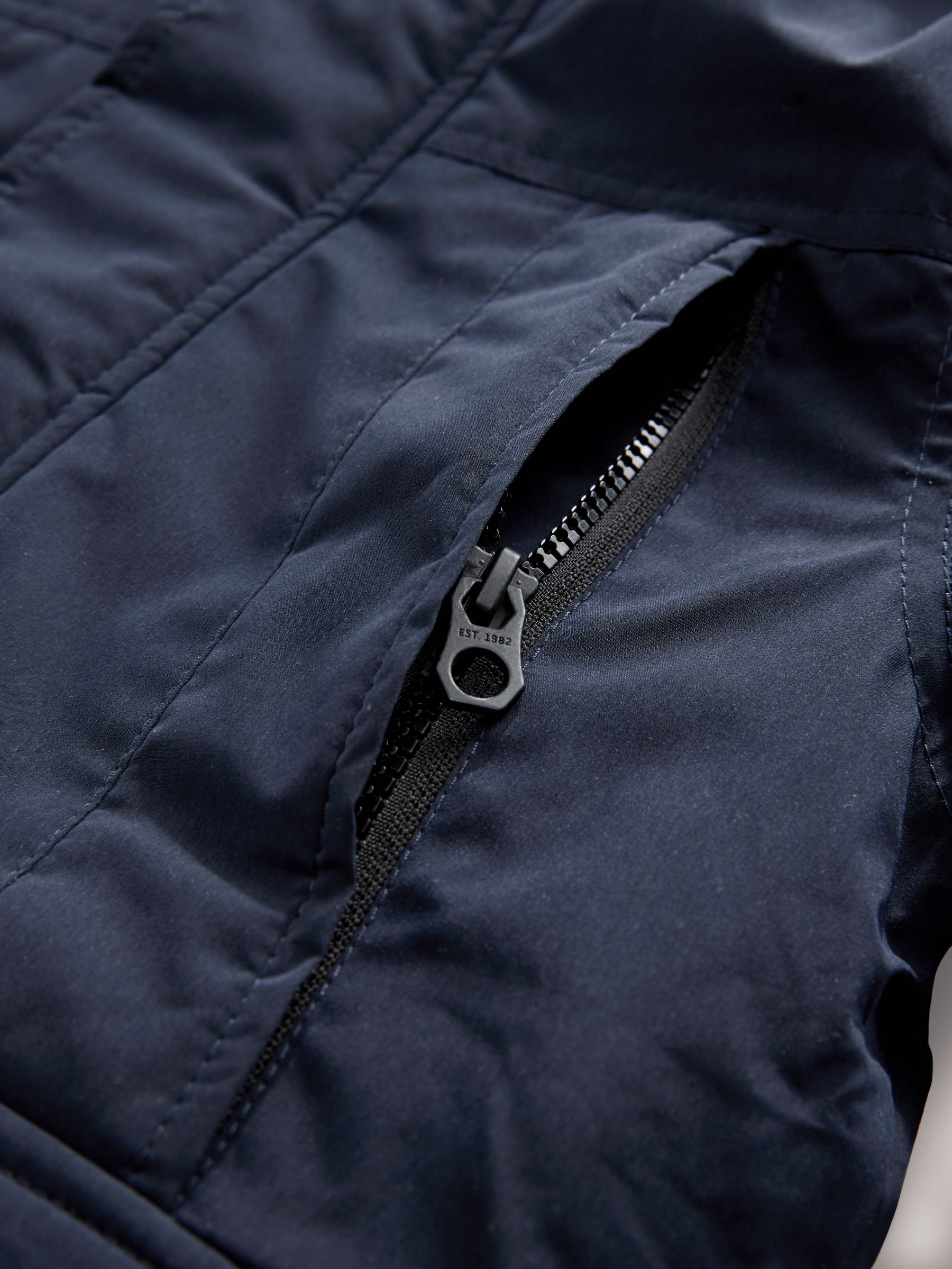 Marineblauw - Zware regenbestendige parka met imitatiebontrand (3-16jr)