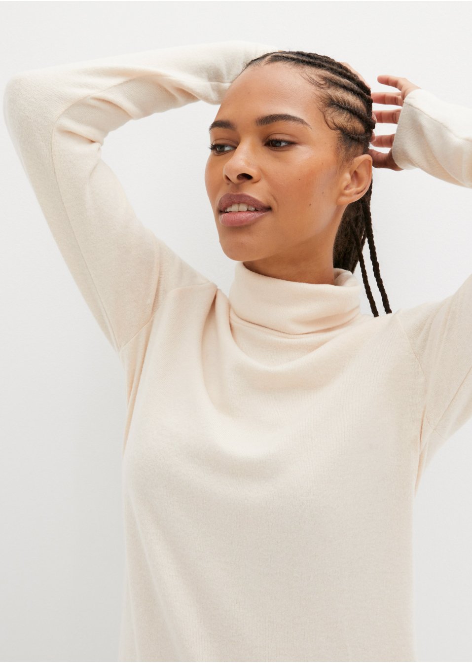 T-shirt long en polaire avec col roulé et fentes latérales