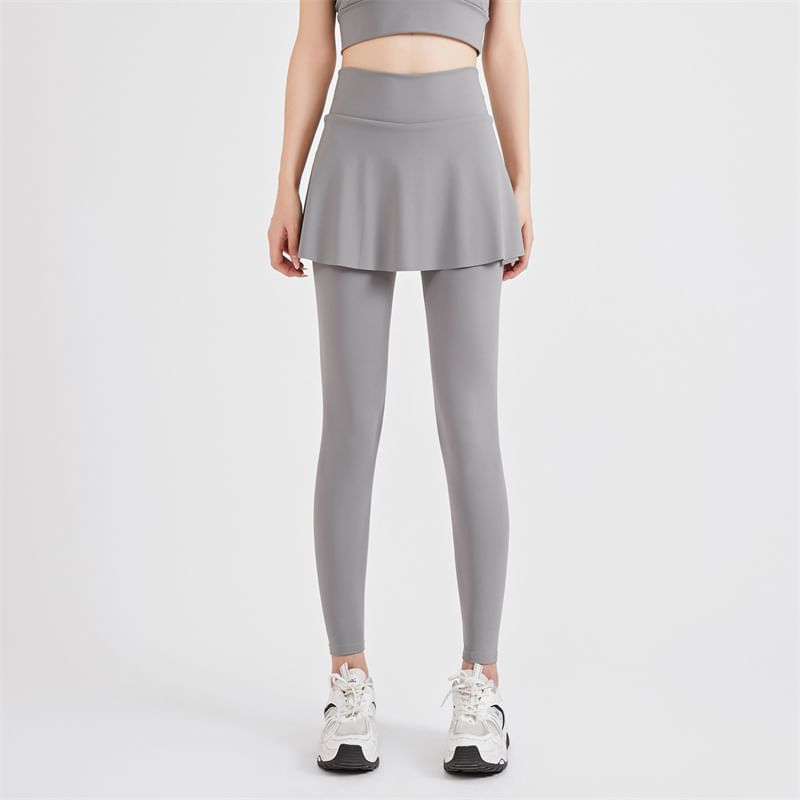 KUMI - Set: Sportieve effen bh-top + yogabroek met hoge taille en rokoverlay