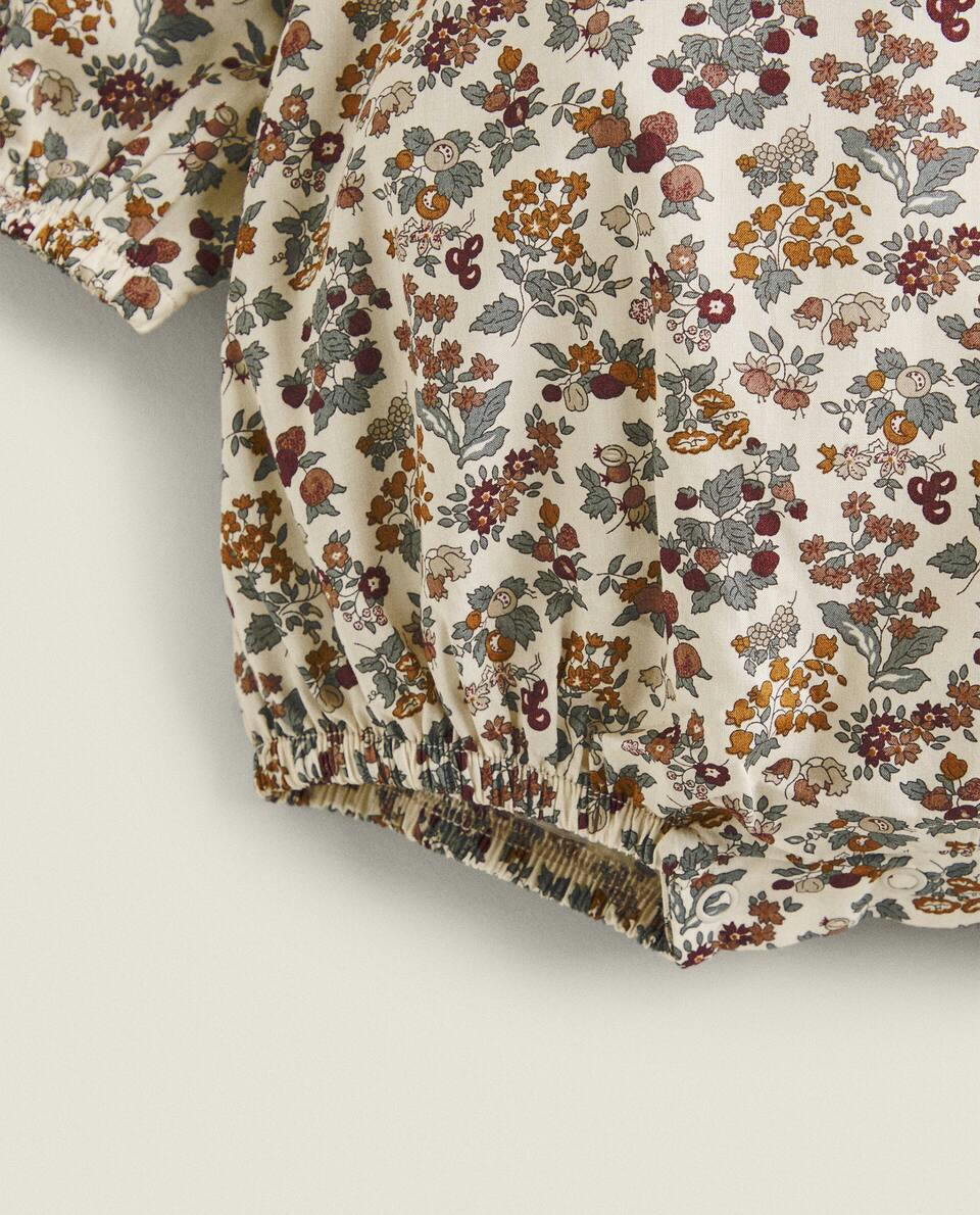 Body infantil em tecido com estampa floral