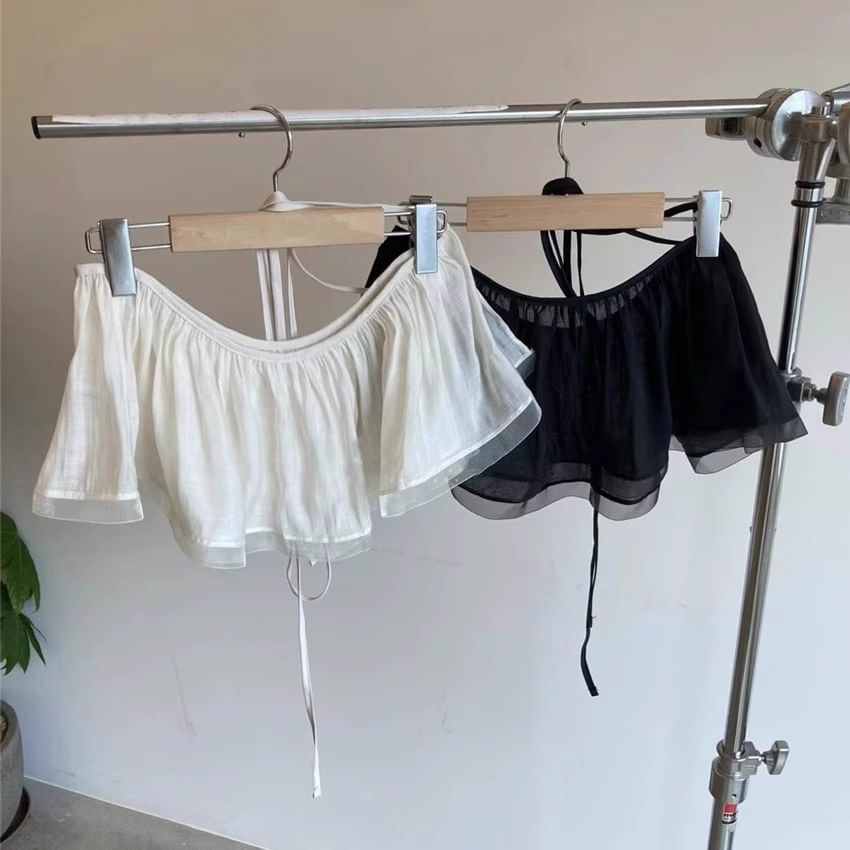 Kilopi - Hoge taille effen mini-overlayrok