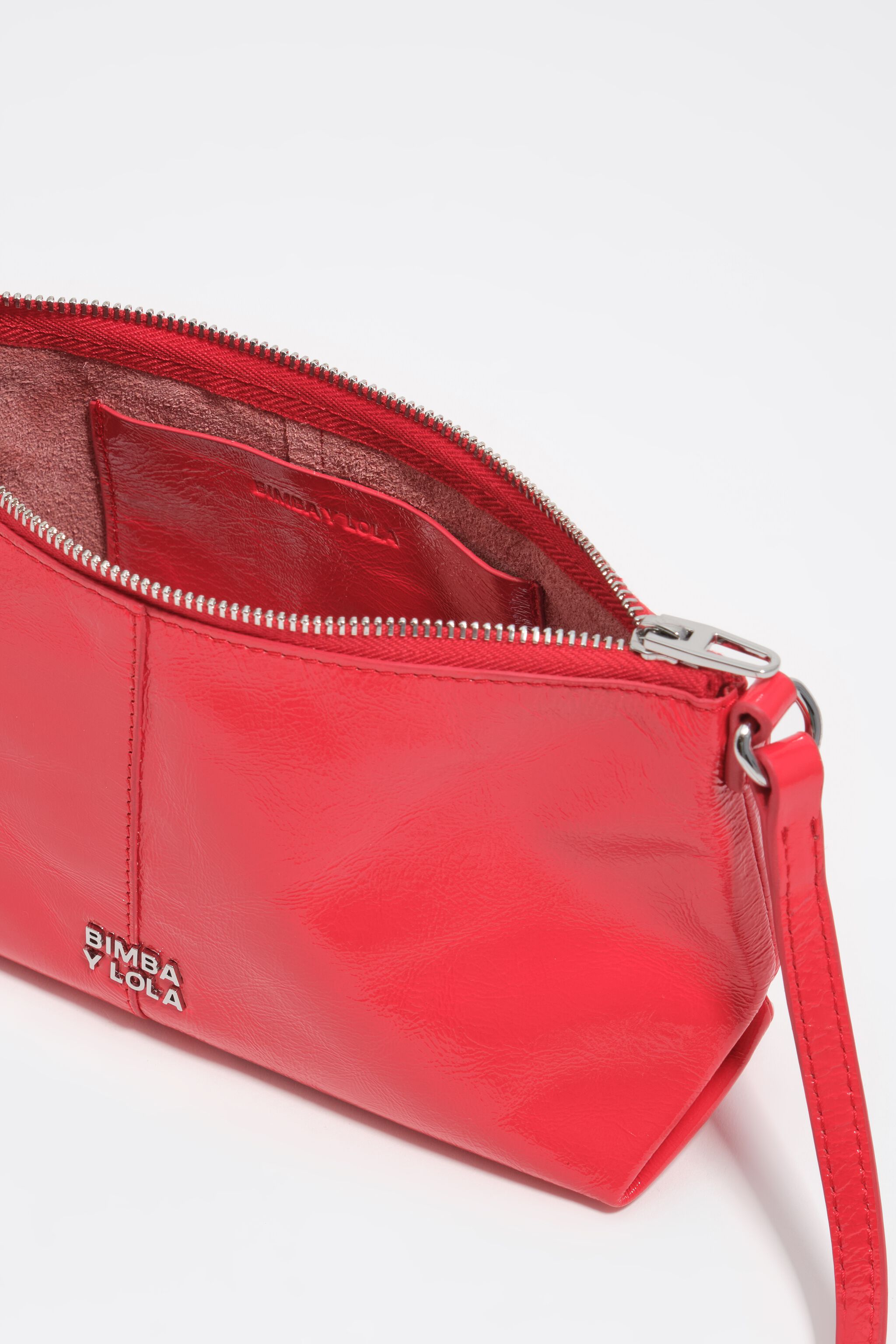 Bolsa transversal mini em couro brilhante vermelho ácido