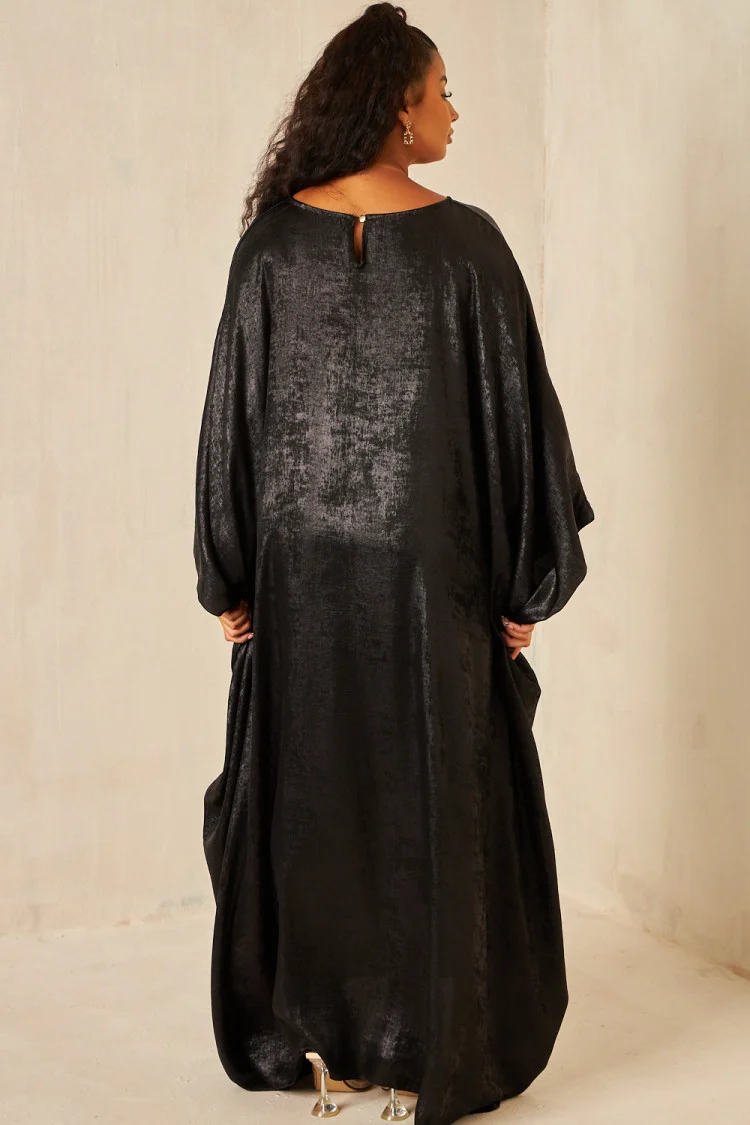 Robe manches chauves-souris pailletée noire