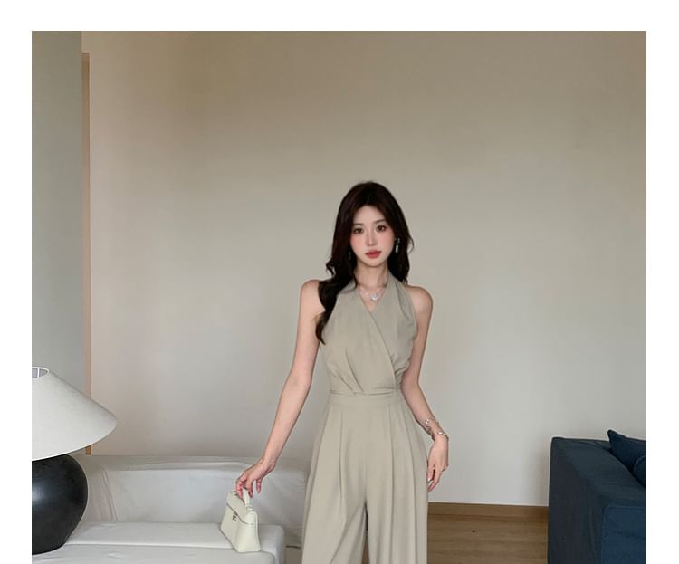 Arabesquito - Mouwloze V-hals jumpsuit met wijde pijpen