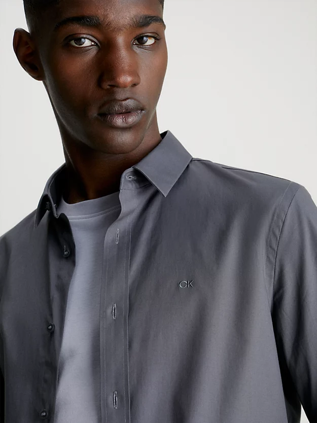Camisa justa de popeline elástica