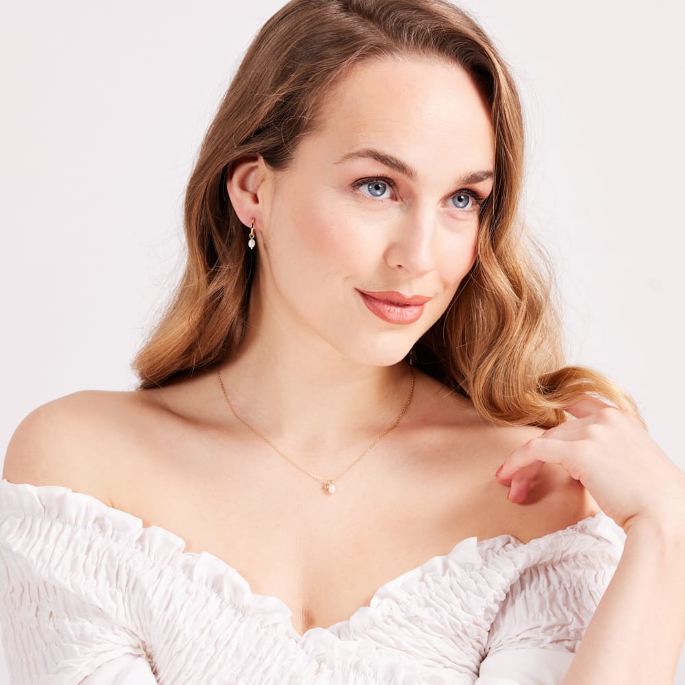 Zilveren set ketting en oorringen zoetwaterparel