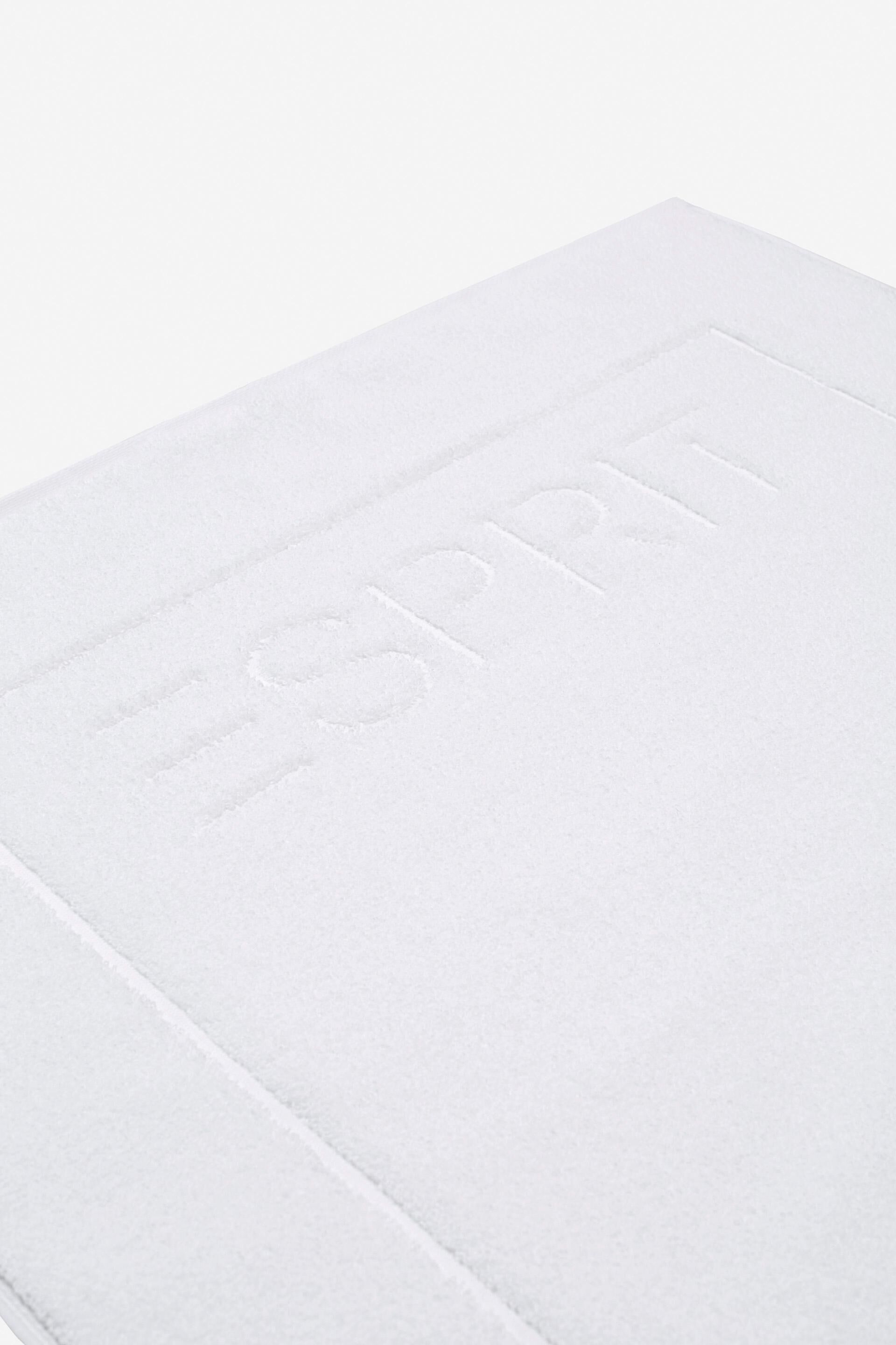 Tapis de bain en tissu éponge 100% coton