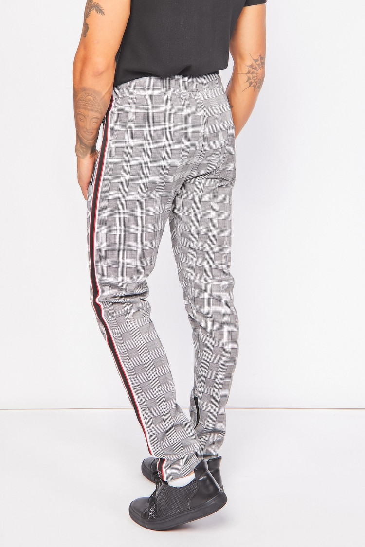 Pantalon de jogging à carreaux et bandes
