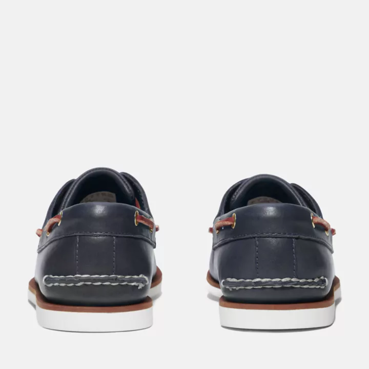 Sapato náutico clássico de dois ilhós para homem, na cor azul.