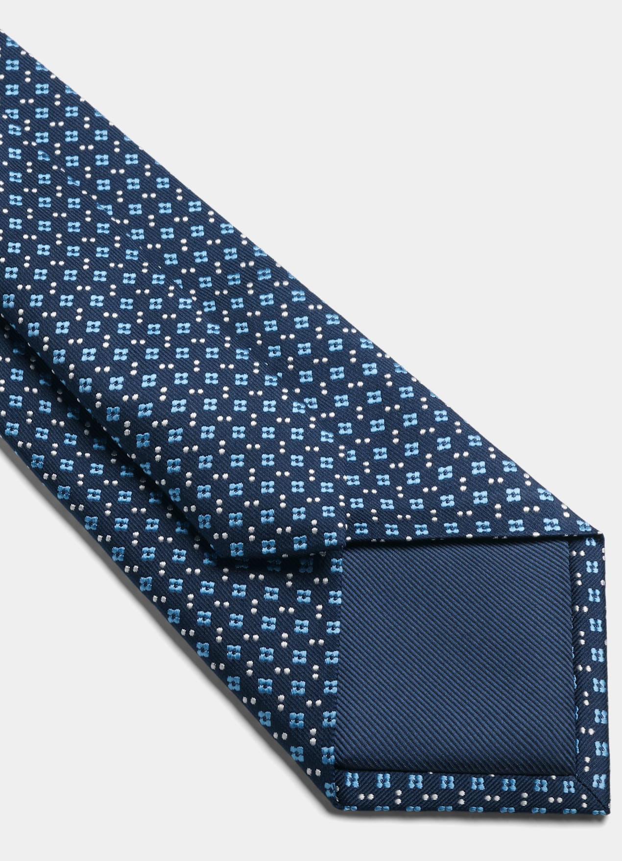 Cravate bleue à fleurs