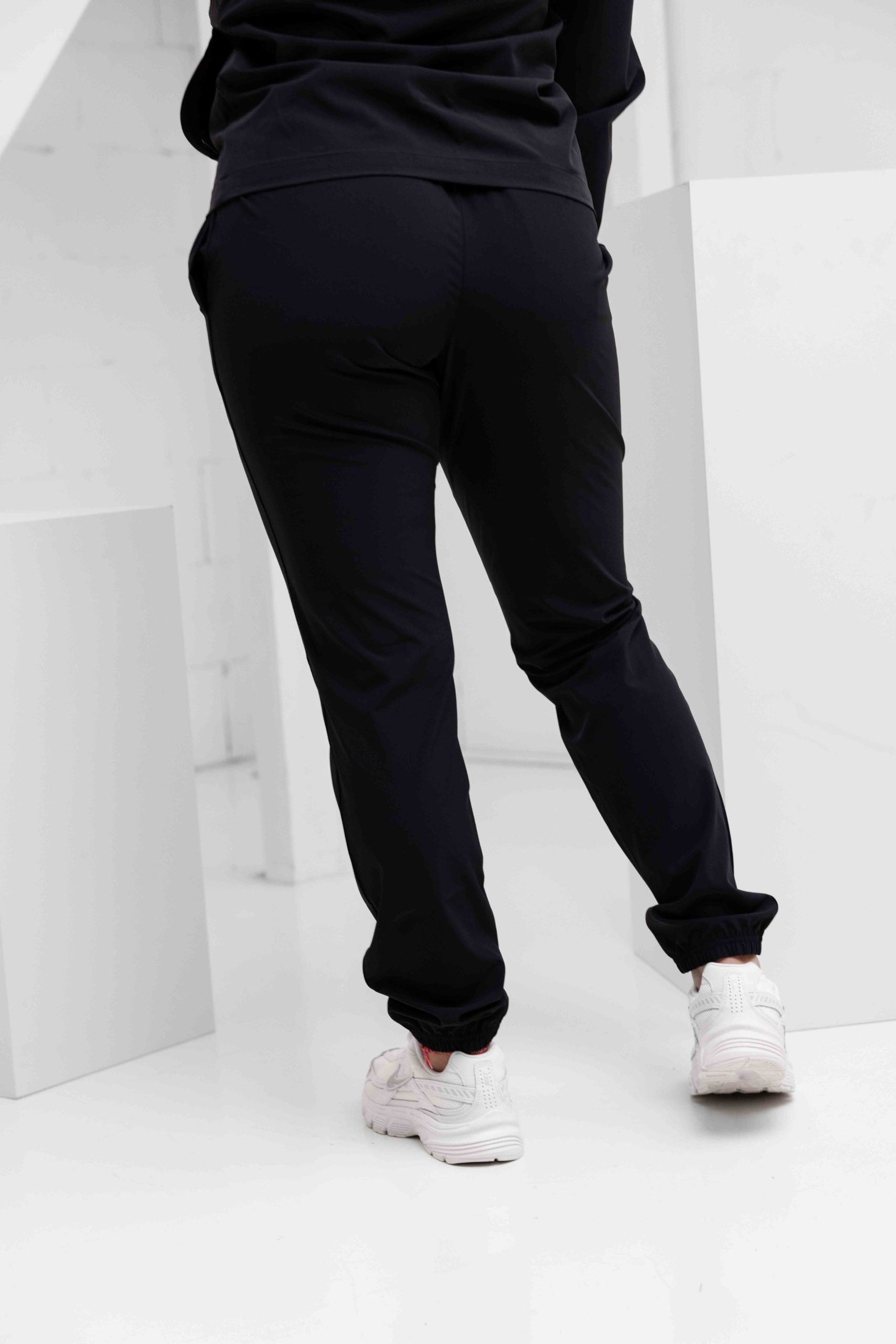 Under Armour Vibe Woven Trainingspak Dames Zwart