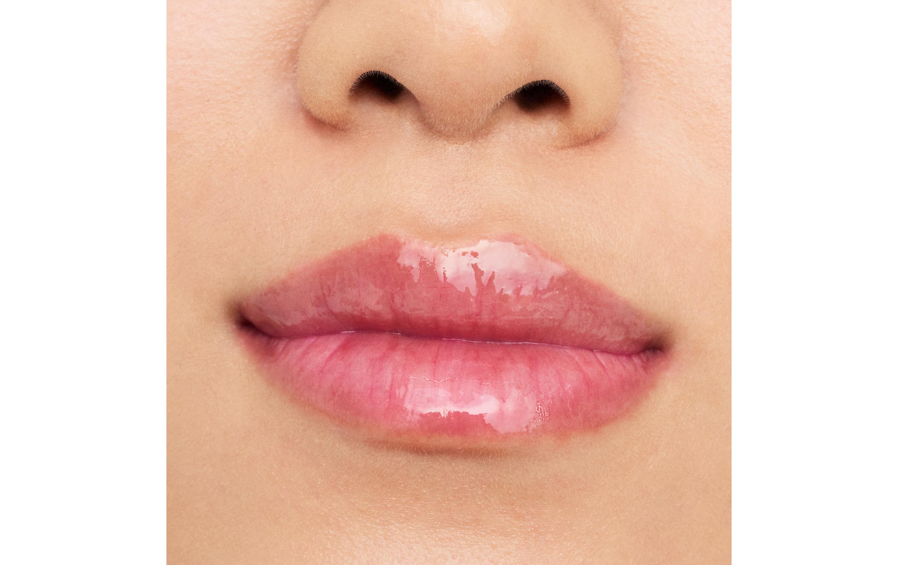 Lip Booster Hydra Kiss 06 Cranberry Is BackPflegendes Lippenöl in einem transparenten Farbton mit einem Hauch von Rosa