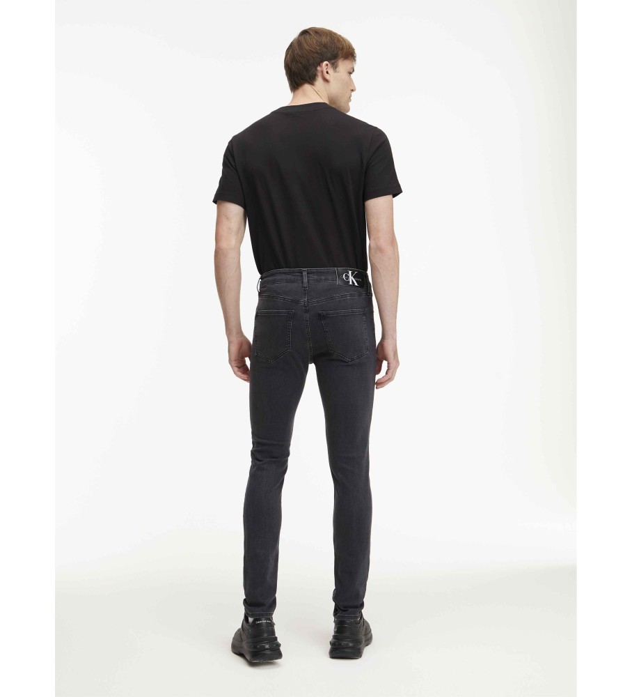 Calça jeans skinny preta Calvin Klein