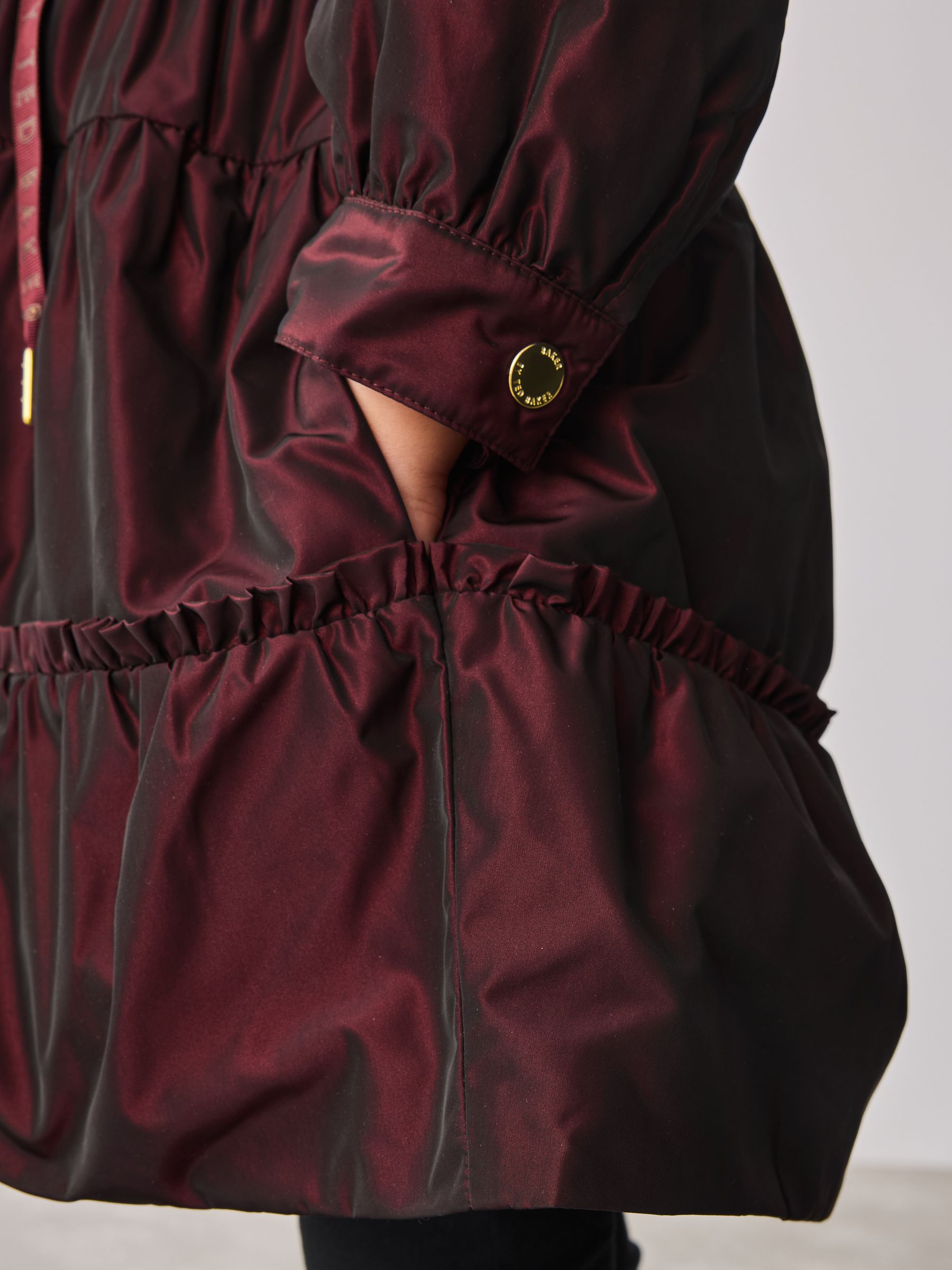 Bessenroze - Baker by Ted Baker regenbestendige regenjas met ruches