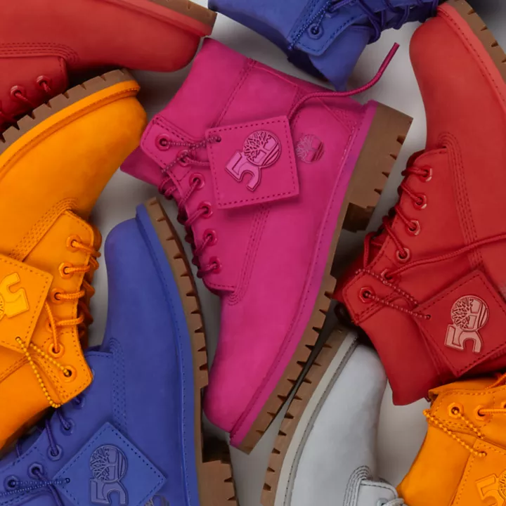 Bota Timberland Premium de 6 polegadas impermeável, edição 50, para jovens, na cor vermelha.