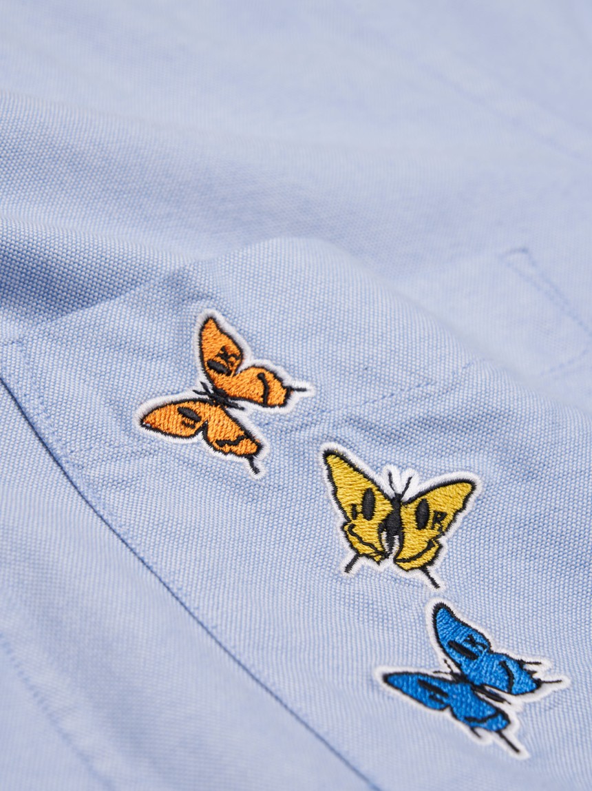 Camisa oxford com borboletas no bolso Lion x Killa