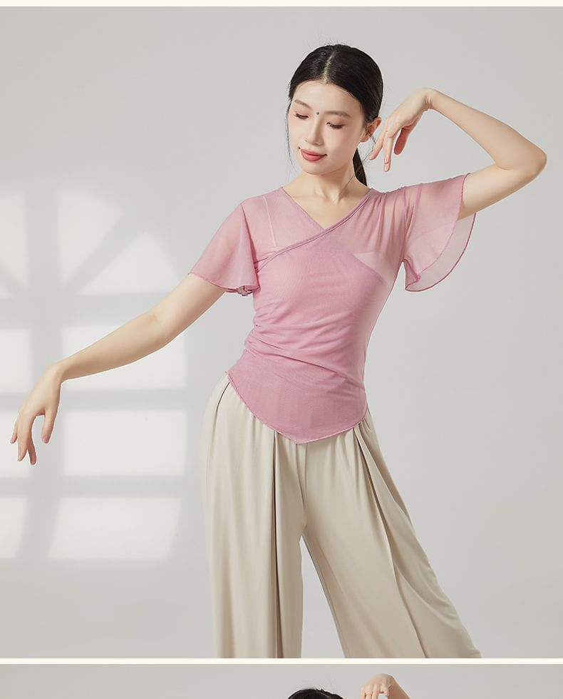 Cossita - Danstop met korte mouwen, V-hals en effen asymmetrische mesh