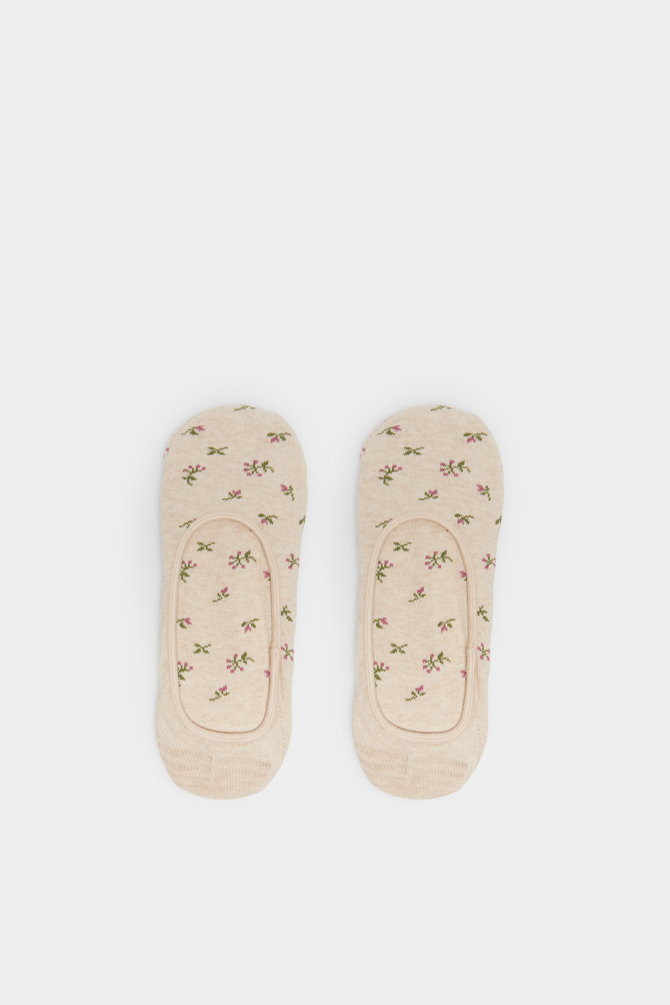 Meia invisível com florzinhas