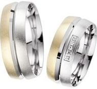 Trouwringen geel en witgoud met Diamanten breedte 7,5 mm
