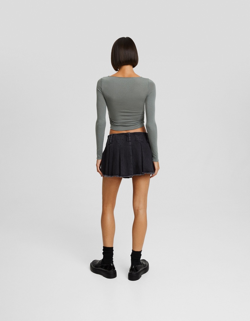 saias-calça plissadas em denim desbotado