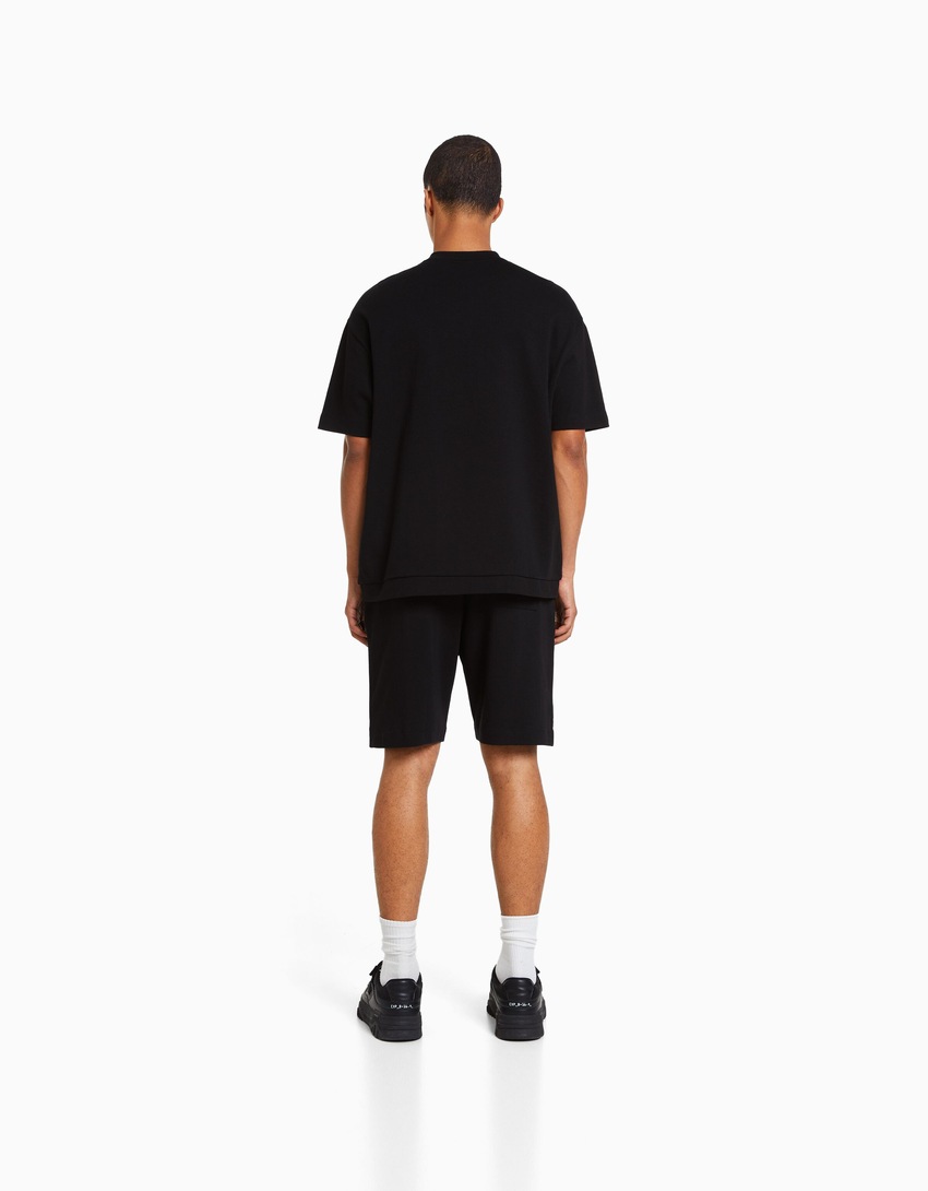 Bermuda de pelúcia Interlock