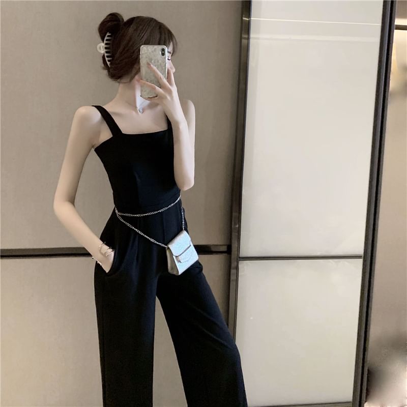 Magma - Mouwloze jumpsuit met open rug en wijde pijpen