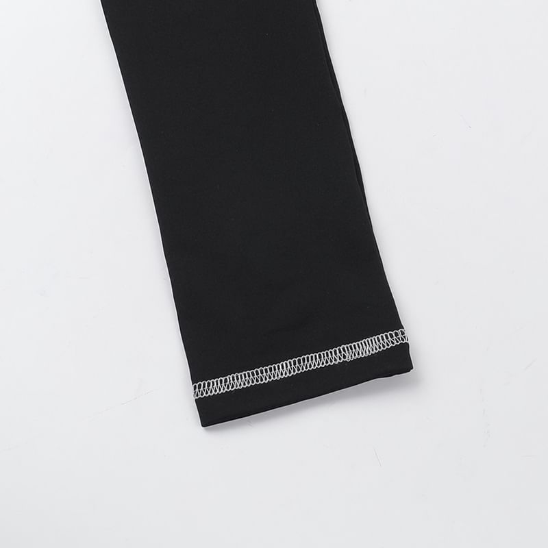 Caarnil - Jumpsuit met lange mouwen, ronde hals en contrasterende stiksels, slim fit