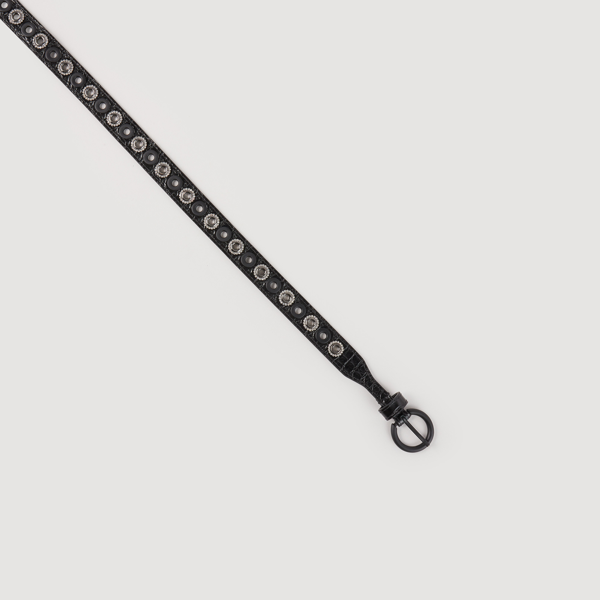 Ceinture en cuir á œillets